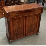 An early 19th century mahogany chiffonier, single drawer with later lion mask loop handles, over