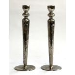 A pair of heavy metal candlestick holders, 29.5cmH