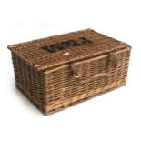 A wicker Fortnum & Mason picnic hamper