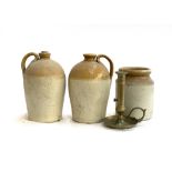 Two stoneware flagons, each 29cmH; together with a stoneware jar and brass ejector candlestick holde
