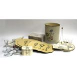 A set of eight Carolyn Sheffield place mats; tray; waste paper bin; six Strauss heavy glass whisky