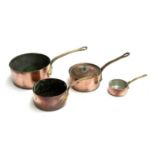 Four copper saucepans with brass handles, one Marin of Italy, the largest 16cmD