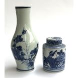 A Chinese blue and white vase of baluster form, decorated with prunus design, character marks to