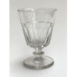 A heavy hand blown cut glass goblet, on knopped stem and thick spreading foot, 13.5cmH