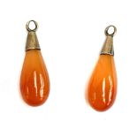 A pair of Victorian yellow metal mounted carnelian drops, 2.5cmL