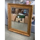 A gilt framed rectangular mirror, the plate 52x42cm