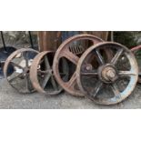 A pair of cart wheels, 32cmD, together with two others, 43cmD and 45cmD