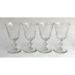 A set of four hand blown cut glass wine glasses, with knopped stems, 15cmH