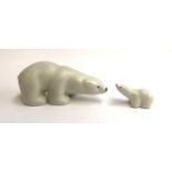 An Arabia Finland polar bear, 13cmL and cub figurine, 5cmL