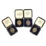 Four Royal Academical Institution, Belfast medals awarded to W J Menary for 50yds 1937, 100yds 1937,