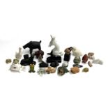 A mixed lot of animal figurines to include Isle of Arran snowy owl; USSR Lomonosov ermine; soapstone
