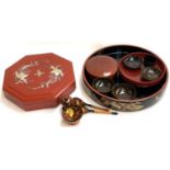 A quantity of lacquered items to include a large Japanese red lacquer octagonal Bento box inlaid