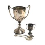 A silver twin handled trophy cup, Birmingham 1938, 16.5cmH; together with one other miniature trophy