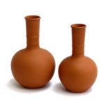 Two terracotta bottle vases, 23cmH and 21cmH