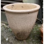 A large stone plant pot, 46cmD, 45cmH