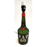 A VAT 69 Scotch Whiskey bottle converted for use as a table lamp, 34cmH to top of fitting