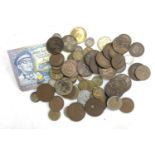 A small quantity of coins and tokens to include some pre 1947 silver