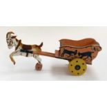 An early 20th century hand painted wooden toy of a goat pulling a cart, 46cmL