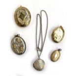 A 9ct gold back and front locket, gross weight 10.2g; together with a gilt metal locket;