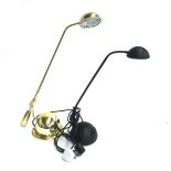 Two opposable desk lights, one gilt metal and one black