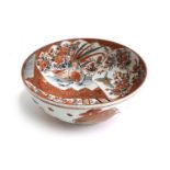 A Japanese Meiji era Kutani bowl, the interior decorated with sparrows amongst flora and court