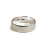 A platinum wedding band, hallmarked, size P 1/2, 6.1g