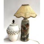 A tall studio pottery table lamp decorated with flowers, 55cmH to top of shade; together with a