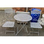 A folding metal garden table and two chairs