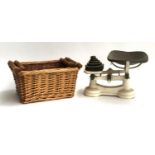 A set of vintage kitchen scales, with weights, together with two wicker baskets, the larger 41cmW