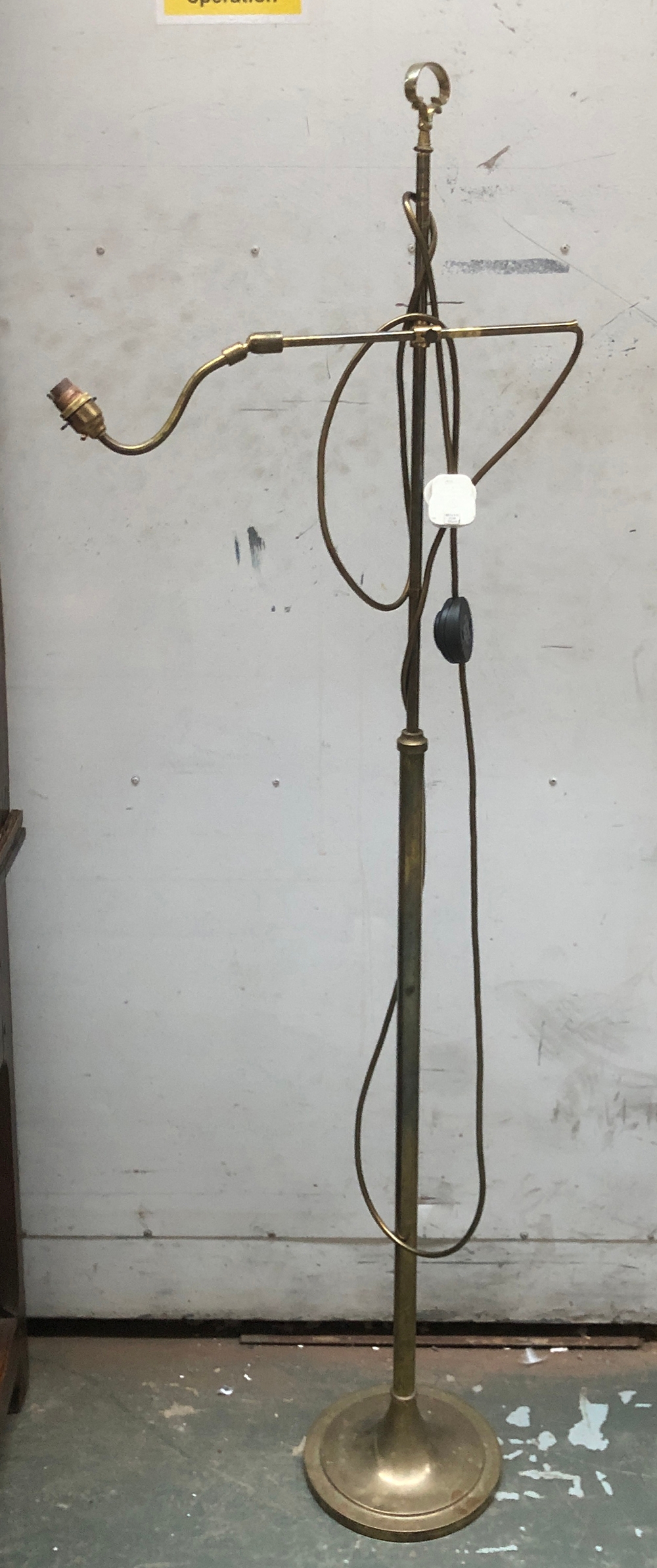 A gilt metal adjustable standard lamp, with balljoint fitting, 153cmH