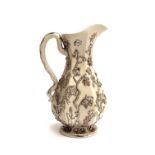 A mid 19th century Villeroy & Boch Mettlach jug, c.1860, with applied silver lustre floral and