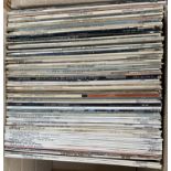 A mixed box of vinyl LPs to include Frank Sinatra, The Beatles, Simon and Garfunkel, Tony Bennett,