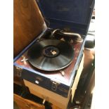 A Garrard portable gramophone with a quantity of 78s