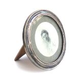 A George V silver circular photo frame, internal diameter 11.5cm, Birmingham 1915