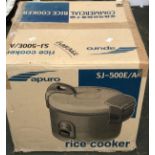 An Apuro rice cooker, boxed