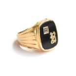 A 14ct gold signet ring, onyx set with diamond and the letter R, size P, 8.3g