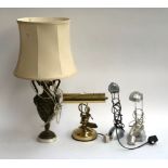 A large resin table lamp; a gilt metal desk lamp and two others