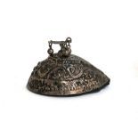 An Islamic white metal mounted pumice stone, 19th century, the domed leaf shape silver body chased