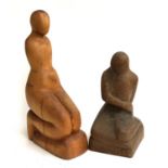 Two carved wooden sculptures of kneeling figures, 46cmH and 33cmH