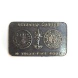 A Devkaran Nanjee Bombay Mint 10 tolas fine 999 silver ingot, approx. 116g