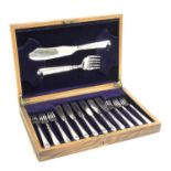 A fitted canteen of six plated fish knives and forks together with servers.