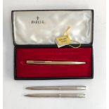 A Parker rolled gold ballpoint pen; together with a 925 silver pen and propelling pencil by Taylor