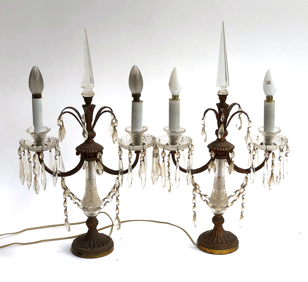 A pair of decorative gilt metal and cut glass table lustre lamps, each with two fittings and central