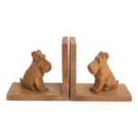 A pair of 20th century carved wood bookends in the form of Schnauzers, 12cmH