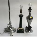 A chromed smoked glass table lamp, 34cmH to base of fitting; a chrome standard lamp 110cmH; and