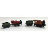 Two tin plate model trains, one clockwork Hornby, together with two tenders, one Hornby MLDL