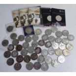 A large quantity of commemorative coins to include D-Day £5 coin presentation pack (3), Countdown to