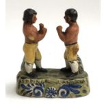 A 20th century Staffordshire 'Spring v Langan' bare knuckle boxing commemorative figure, 20.5cmH