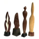 Four carved wooden sculptures, the tallest 68cmH