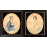 A pair of 19th century oval aquatints, portraits of a boy and a girl, in verre eglomise mounts,